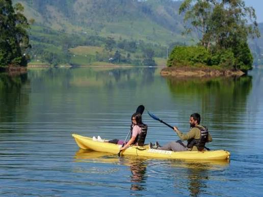 A kayak floating peacefully on a clear lake